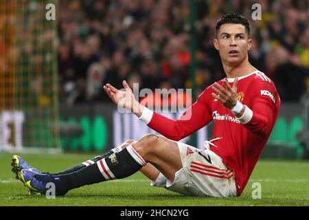 Cristiano Ronaldo of Manchester United reacts after a challenge with Grant Hanley of Norwich City - Norwich City v Manchester United, Premier League, Carrow Road, Norwich, UK - 11th December 2021  Editorial Use Only - DataCo restrictions apply Stock Photo