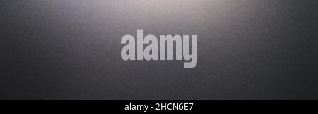 Black plastic texture or background or backdrop, banner size, with copyspace for your individual text. Stock Photo