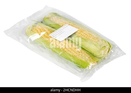 Packaged and labeled corncob on an isolated white background Stock Photo