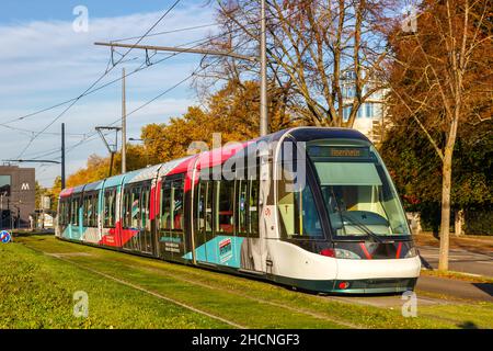 Strasbourg, France - October 29, 2021: Modern light rail tram model Alstom Citadis public transport transit transportation traffic in Strasbourg, Fran Stock Photo