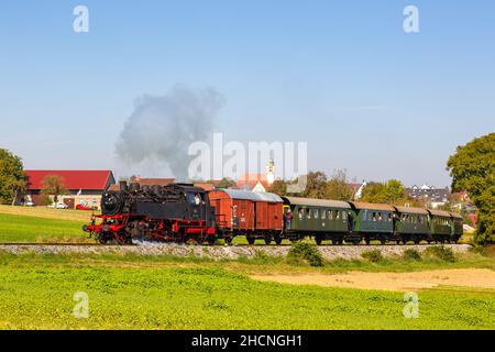 Heimerdingen, Germany - October 10, 2021: Steam train locomotice railway engine of Strohgäubahn in Heimerdingen, Germany. Stock Photo