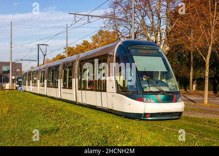 Strasbourg, France - October 29, 2021: Modern light rail tram model Alstom Citadis public transport transit transportation traffic in Strasbourg, Fran Stock Photo