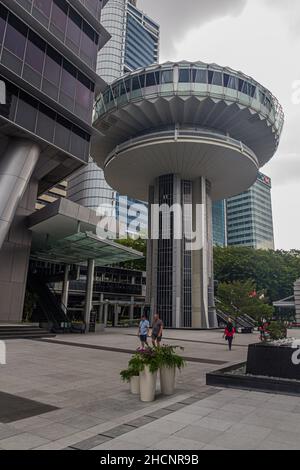 SINGAPORE, SINGAPORE - MARCH 11, 2018: OUE Tower in Marina Bay, Singapore Stock Photo