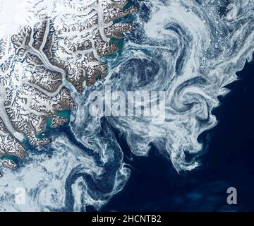 Arctic sea with Arctic remnant ice through the Fram Strait near Svalbard Stock Photo