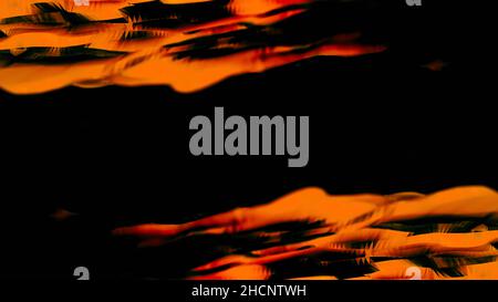 Abstract animation with wide, curved, orange lines under the flow of water. Glowing waves of the abstract river or stream Stock Photo