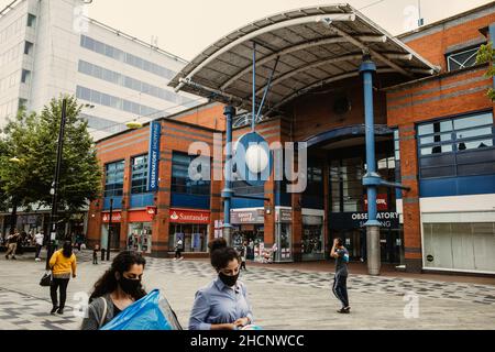 Slough, UK. 10th July, 2021. Shoppers pass the Observatory shopping centre. Plans are shortly expected to be submitted to Slough Borough Council to re Stock Photo