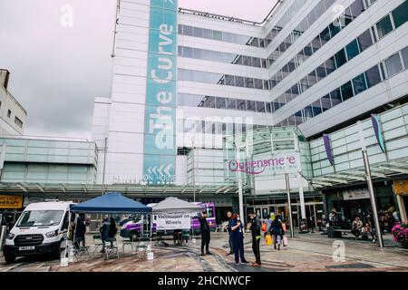 Slough, UK. 10th July, 2021. Shoppers approach an entrance to the Queensmere shopping centre. Plans are shortly expected to be submitted to Slough Bor Stock Photo