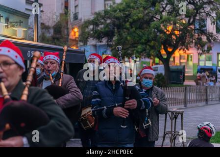 29th June 2021, Cangas de Morrazo, Pontevedra, Spain. A group of traditional Galician bagpipe musicians playing in the streets of Cangas de Morrazo. Stock Photo