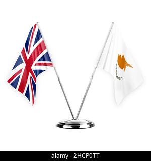 Two table flags isolated on white background 3d illustration, united kingdom and cyprus Stock Photo