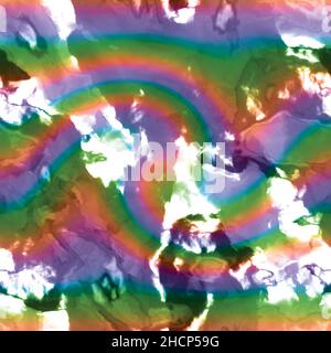 Grungy Mottled Tarnished Metal Foil Seamless Tile Textured Pattern in Rainbow Swirl Stock Photo