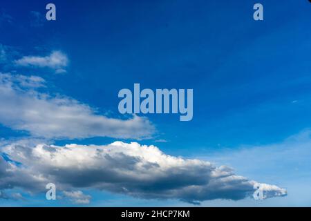 Natural white cloud floating on the blue sky Stock Photo