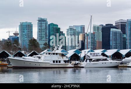 Vancouver British Columbia, Canada. Winter cityscape of Vancouver with yachts and boats in the harbour-December 26, 2021. Nobody, street view, selecti Stock Photo