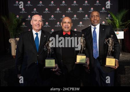 Jim Delany (Big Ten), Anthony Davis (USC) and Ron Simpkins (Michigan) with Hall of Fame trophies during the Rose Bowl Hall of Fame Induction Ceremony, Stock Photo