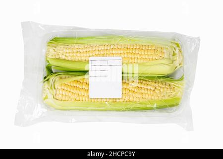 Packaged and labeled corncob on an isolated white background Stock Photo