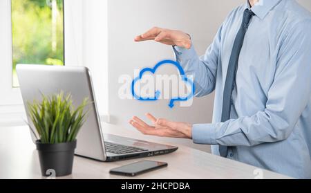 Business man holding icon cloud computing network and icon connection data information in hand. Cloud computing and technology concept Stock Photo