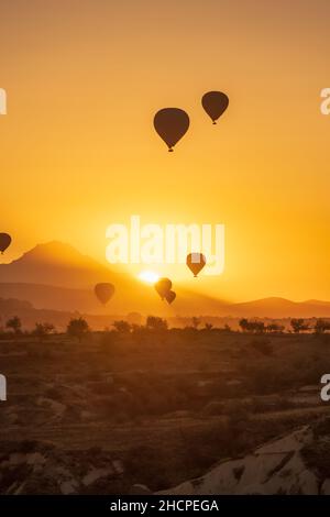 Ballon ride experience in Capadoccia, Turkey. Float Over Cappadocia's Stunning Landmarks and Volcanic Spires! Stock Photo