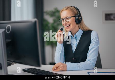 Woman having video all at home Stock Photo