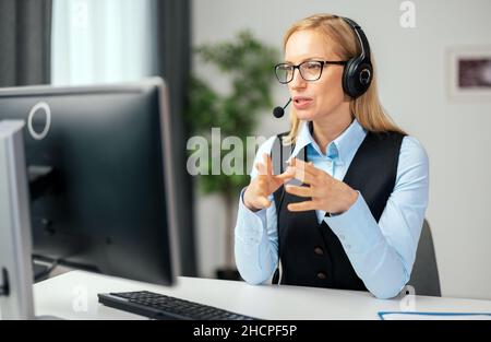 Woman having video call at home Stock Photo