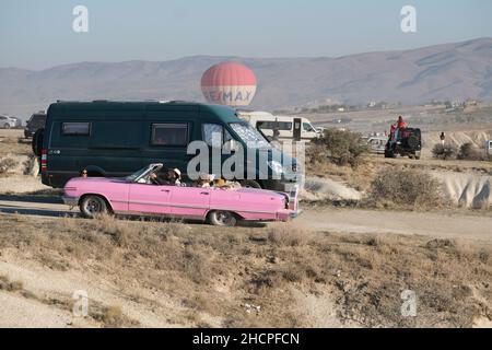 Classic car and campervan in Capadoccia. Ballon ride experience in Capadoccia, Turkey. Stock Photo