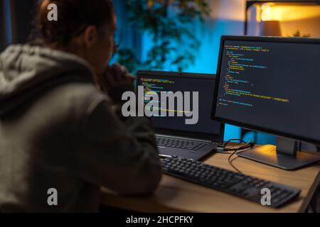 Programist working on computers Stock Photo