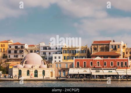Beautiful Hassan Pascha Mosque at daytime at Venetian Port of Chania, Crete Island - Greece Stock Photo