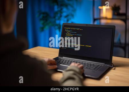 Developer working on laptop Stock Photo