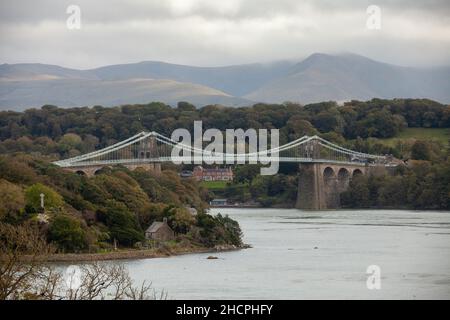 Menai Bridge, crossing the Menai Straits, designed by Thomas Telford, Anglesey, Wales, UK Stock Photo