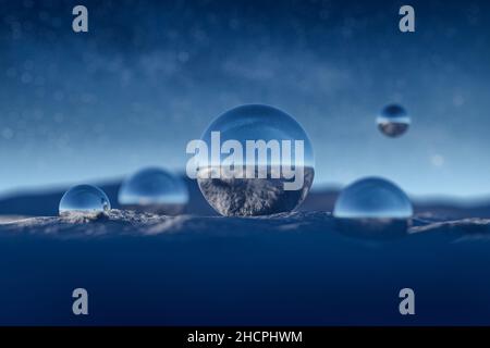 Blue reflective balls in snow against epic star sky in winter. Milky way and stars. Abstract background. 3D rendering. Stock Photo