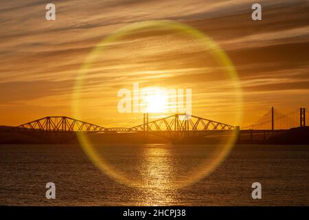 Sunset over the Forth Bridge seen from Dalgety Bay Stock Photo