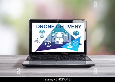 Drone delivery concept shown on a laptop screen Stock Photo