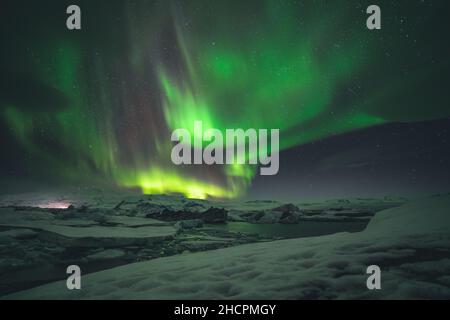 Northern Lights and Aurora Borealis over Joekulsarlon Glacier Lagoon in South Iceland Stock Photo