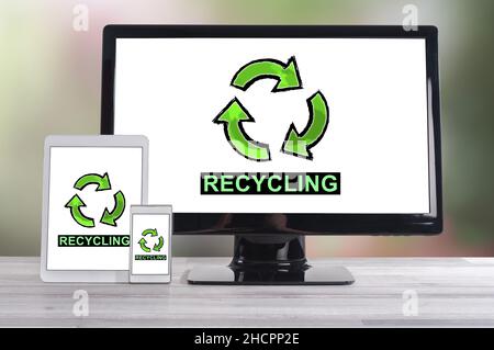 Recycling concept shown on different information technology devices Stock Photo