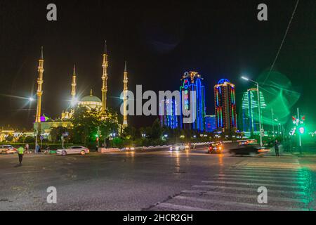 GROZNY, RUSSIA - JUNE 24, 2018: Akhmad Kadyrov Mosque officially known as The Heart of Chechnya and skyscrapers of Grozny City in Grozny, Russia. Stock Photo