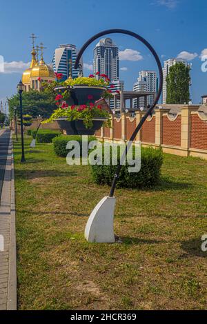 Grozny City buildings and Khram Mikhaila Arkhangela church in Grozny, Russia. Stock Photo