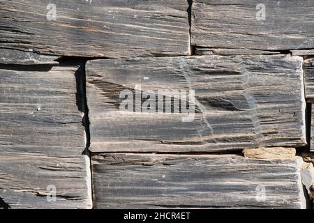 Closeup of rusty Rectangular slate tiles on a sunny day Stock Photo