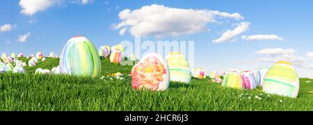 Many colorful watercolor Easter eggs to be searched and hunted on a meadow for Easter Stock Photo