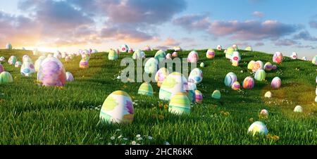 Many colorful easter eggs in the grass of a meadow for easter Stock Photo