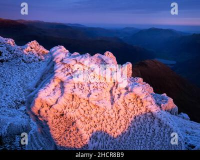 The summit of Red Screes covered by hoar frost at sunrise, Lake District UK. Stock Photo