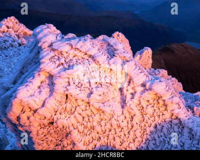 The summit of Red Screes covered by hoar frost at sunrise, Lake District UK. Stock Photo