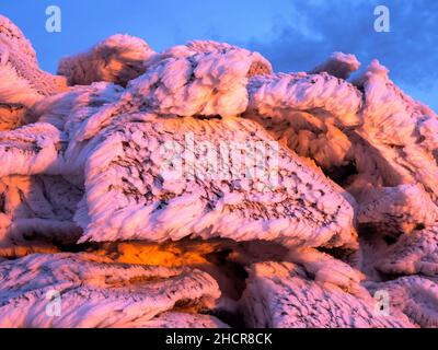 The summit of Red Screes covered by hoar frost at sunrise, Lake District UK. Stock Photo