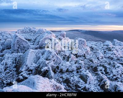 The summit of Red Screes covered by hoar frost at sunrise, Lake District UK. Stock Photo