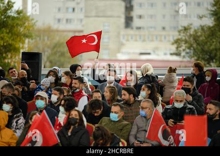 Istanbul, Turkey - October 29, 2021: People are watching celebration of republic day of Turkey 29 october. Editorial shot in Istanbul. Stock Photo