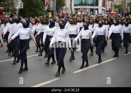 Istanbul, Turkey - October 29, 2021: Schoolgirls with scarfs parade on 29 October Republic Day of Turkey. Editorial shot in Istanbul. Stock Photo