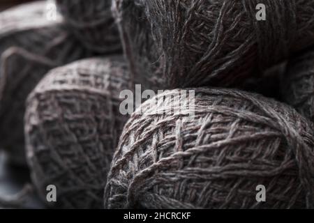 Balls of brown wool yarn made of natural wool. Needlework Stock Photo