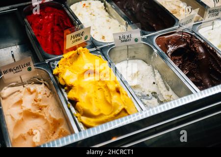 Closeup shot of various ice cream flavors on a shop Stock Photo