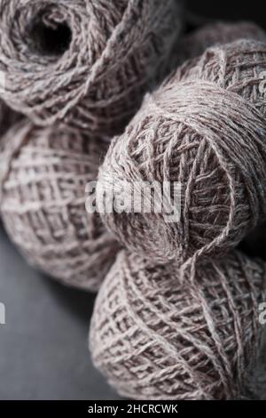 Light brown wool yarn made of threads in tangles. Needlework Stock Photo