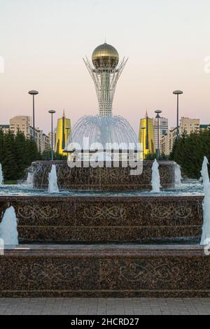 Fountain and Bayterek Tower in Astana now Nur-Sultan , capital of Kazakhstan Stock Photo