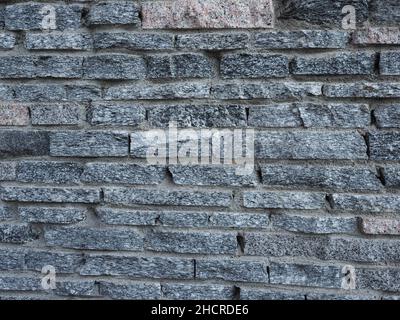 dark grey stone wall useful as a background Stock Photo - Alamy