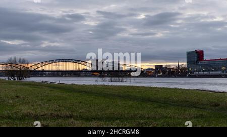 Prominent buildings on riverbanks of Rhine river in Cologne, Germany Stock Photo