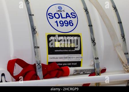 Detail of an inflatable life raft on the Cunard cruise liner Queen Elizabeth.  SOLAS requirements Stock Photo